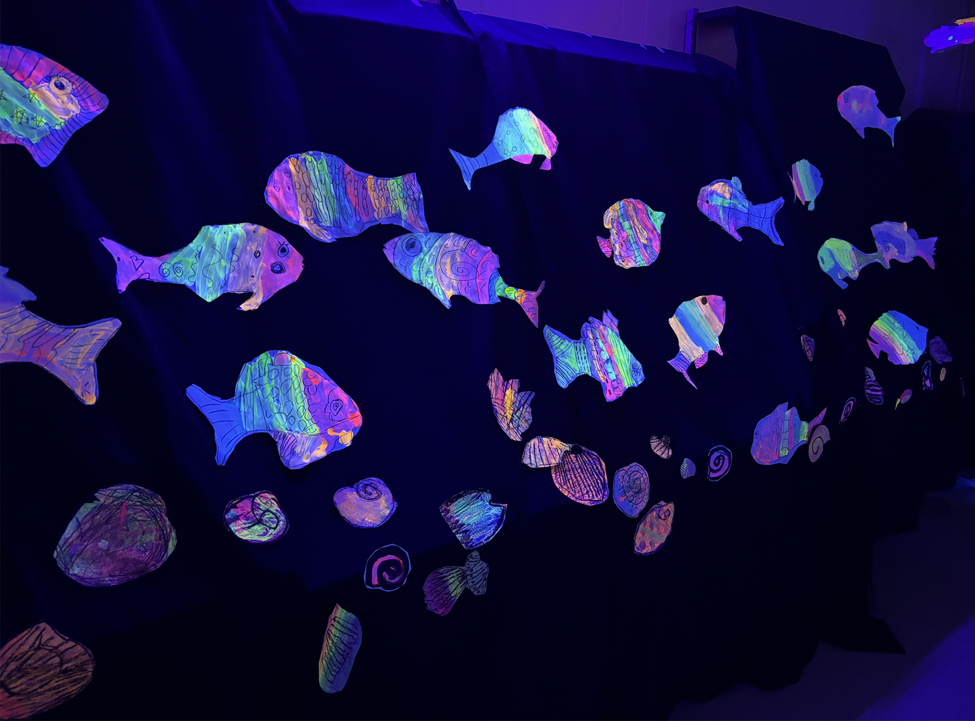The aquatic-themed glow room at South Row Elementary School's Art Show on Thursday, May 14, 2026.